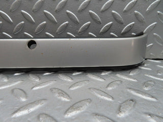 C140 Coupe left headlight bezel used OEM