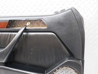 W124 Cabriolet left door card black used OEM