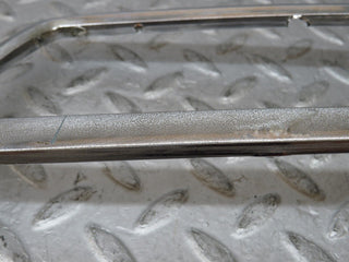 W108 tail light chrome frame left used OEM