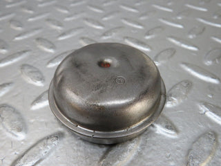 W124 Coupe wheel hub locking cap used OEM
