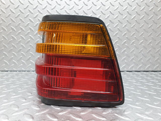 W124 tail light right side used OEM