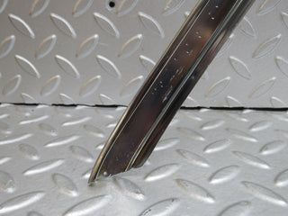 W109 rear left door chrome window frame used OEM