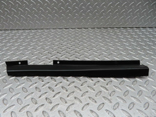 W123 front right cable channel cover used OEM
