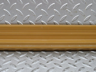 W123 front right door sill trim palomino used OEM