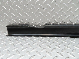 W123 front left cable channel cover used OEM