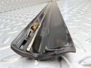 W123 front left door lower moulding trim used OEM