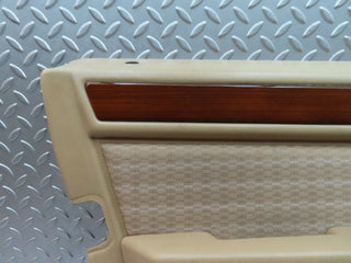 W124 front left door card beige used OEM