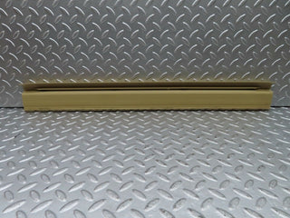 W123 front left door sill trim beige used OEM