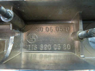 W116 number plate light holder chrome moulding used OEM