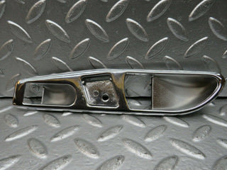 R107 SLC interior door handle chrome surround right side used OEM