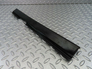 W123 cable channel cover front left used OEM