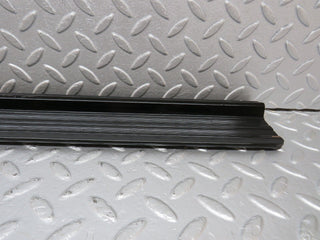 W123 front left door sill trim black used OEM