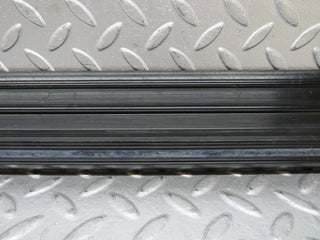 W123 front left door sill trim black used OEM