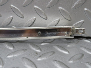W108 rear left door window chrome channel used OEM