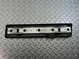 W123 tail light bulb holder right used OEM