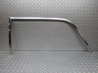 W109 rear left door chrome window frame used OEM
