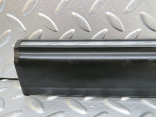 W123 front left door lower moulding trim used OEM
