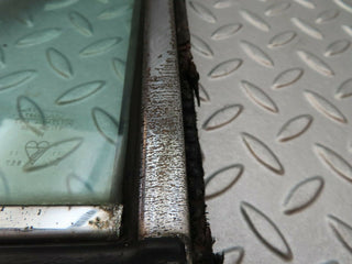 W114 front left quarter window glass used OEM