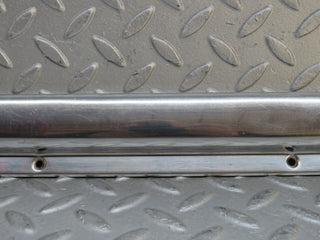 W109 front left door sill chrome used OEM