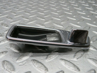 W123 Wagon chrome frame for door opener left used OEM