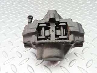 W124 Wagon rear left brake caliper used OEM