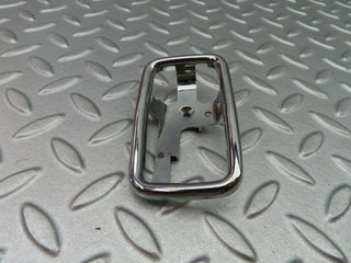W123 chrome frame for door opener left used OEM