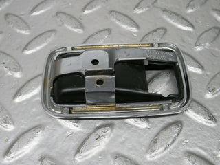 W108 chrome frame for door opener left used OEM
