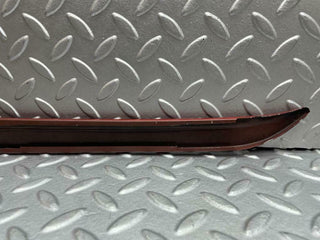 W116 front left passenger side window trim fill used OEM