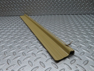W123 front left door sill trim beige used OEM