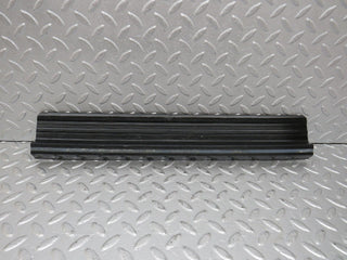 W123 rear right door sill trim black used OEM