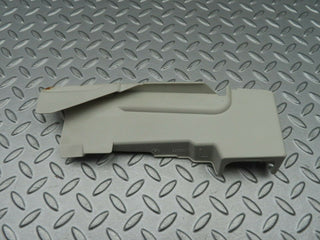 W124 lock cover front left used OEM