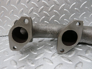 W126 exhaust manifold left used OEM