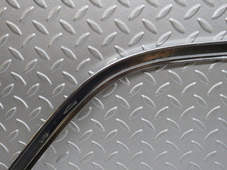 W109 rear left door chrome window frame used OEM