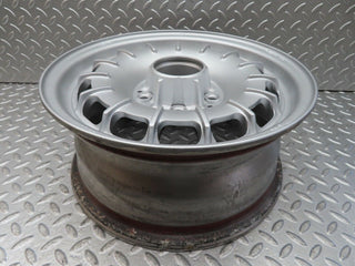 W123 alloy wheel mexican hat 6jx14h2 et30 used OEM