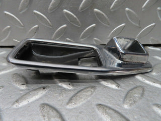 W123 chrome frame for door opener right used OEM