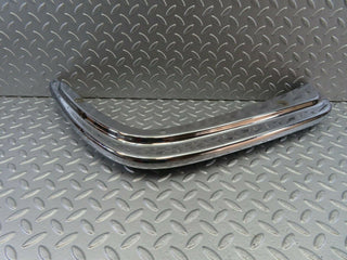 W108 front left upper bumper corner used OEM