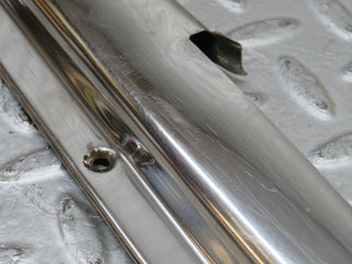 W109 front left door sill chrome used OEM