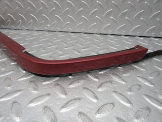 R129 SL left headlight lower trim used OEM