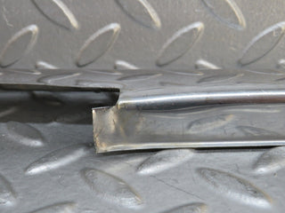 W109 front left door sill chrome used OEM