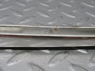 W108 front left door chrome window channel used OEM