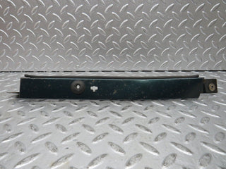 W124 Wagon under headlight trim left used OEM