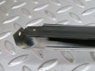 W109 left skirt chrome trim strip used OEM