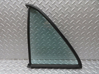 W123 rear left quarter window used OEM