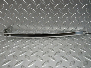 W108 rear left chrome window channel used OEM