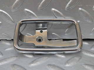 W123 door handle surround left used OEM