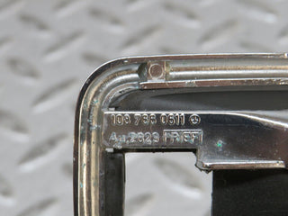 W123 chrome frame for door opener right used OEM
