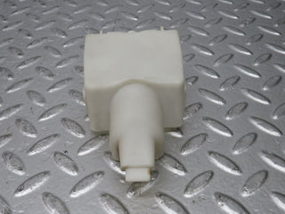 W124 Wagon rear door lock vacuum actuator cover used OEM