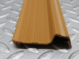 W123 front right door sill trim palomino used OEM