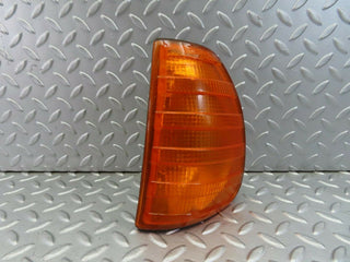 W123 indicator light front left used OEM