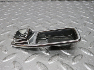 W123 chrome frame door handle front left used OEM